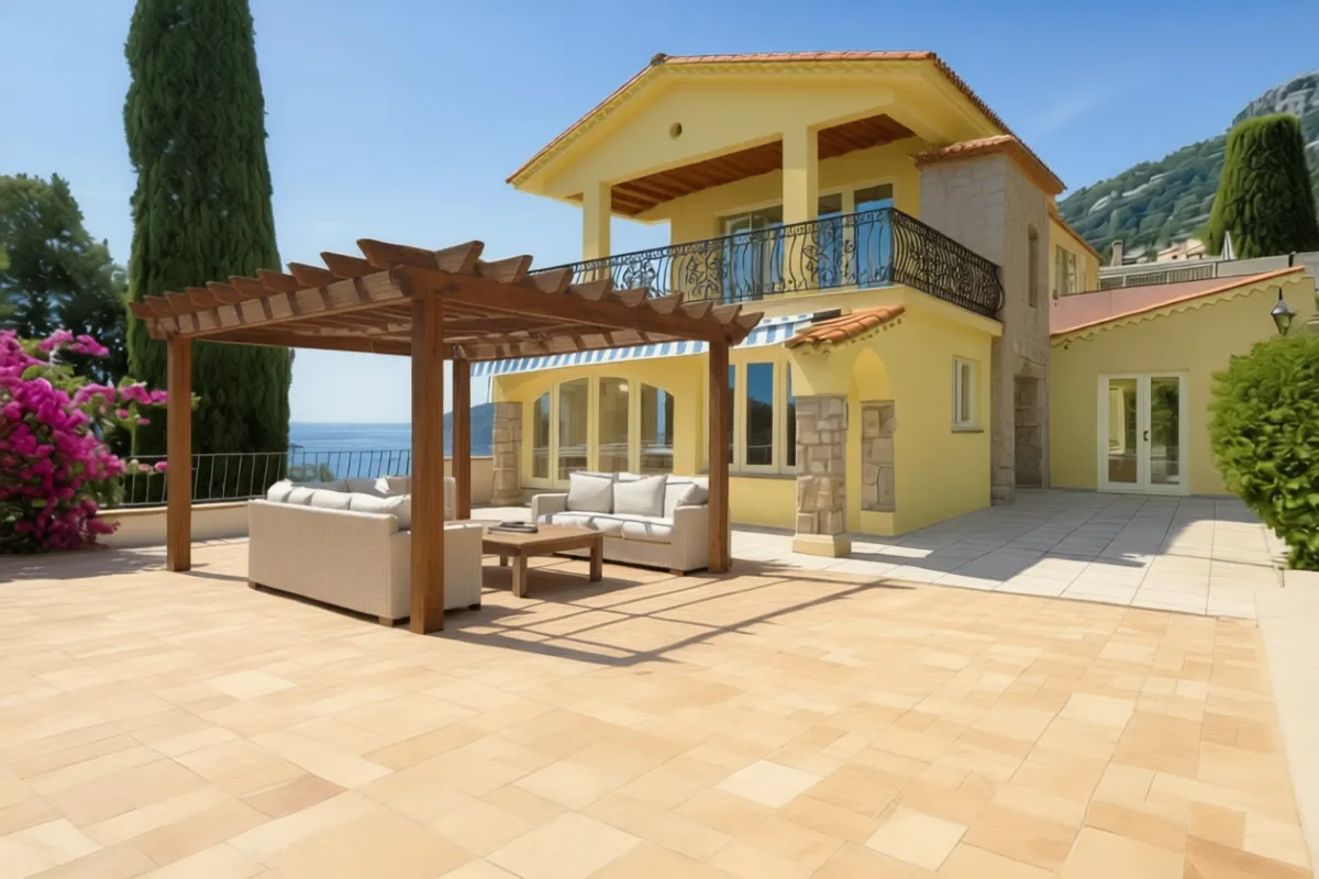 Second floor added — south-facing balcony and open terrace overlooking the bay